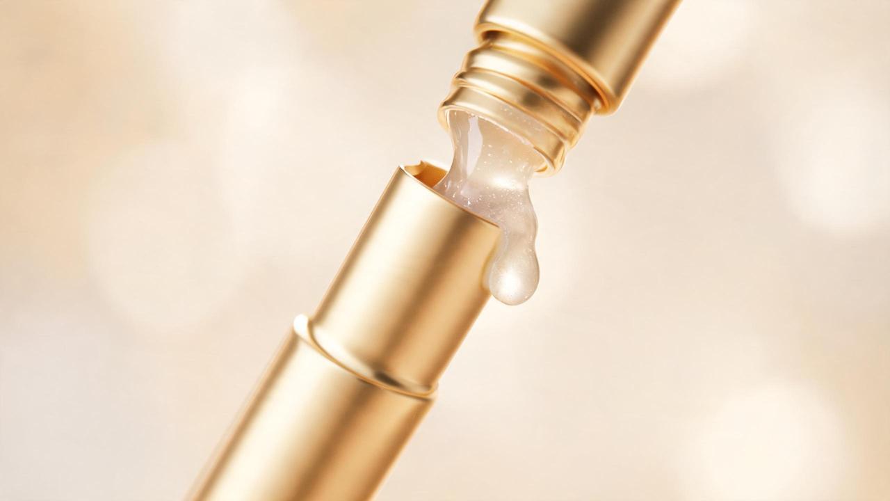 Elegant Korean collagen ampoule in gold packaging with glossy serum texture